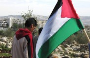 Kids with a Palestinian flag